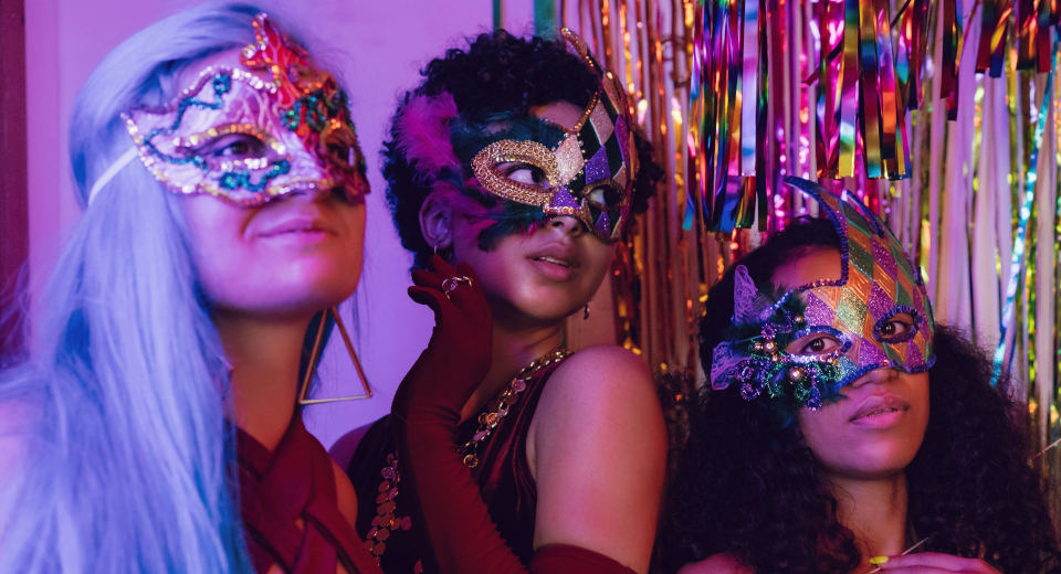 "Venetian Masquerade" "4 women at a theme party with a Venetian masked ball"