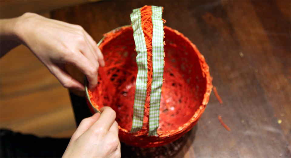 Homemade Easter basket craft with fabric ribbons